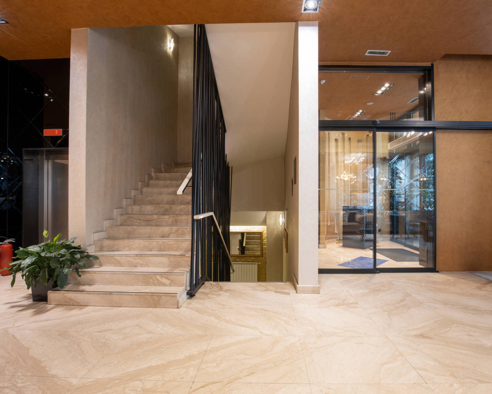 Hotel Lobby Interior With Marble Floor And Stairs